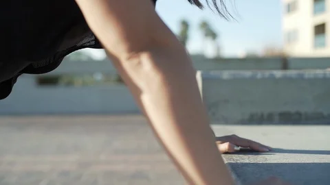 Woman doing push ups with support of a wall Stock Footage 105622429