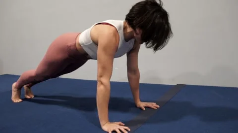 Woman Doing Pushups in Slow Motion Stock Footage 141474519