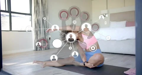 Woman doing seated side stretch mid-sequence, node overlay fading in and showing Video stock 320626587