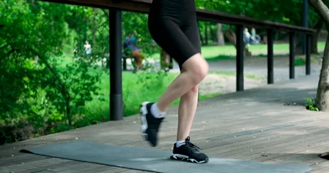 Woman doing a workout exercise Stock Footage 155107076
