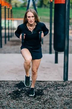 Woman is doing workout. Stock Photos