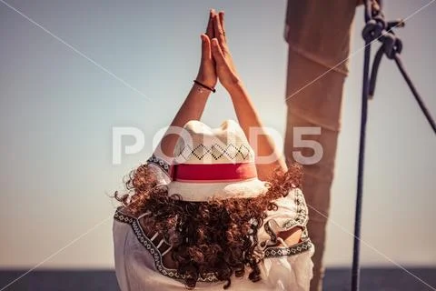 Woman doing yoga exercises Stock Photos