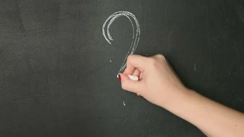 Woman drawing a simple question mark on the blackboard. Idea concept. Stock Footage 166353601