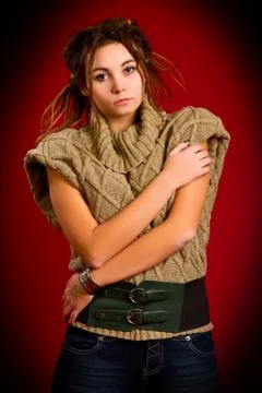 Woman with dreadlocks on a red background Stock Photos