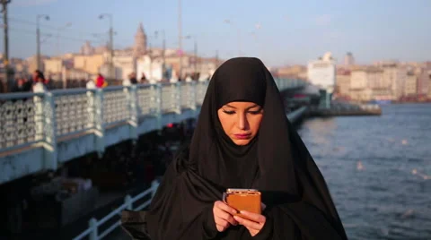 Woman dressed with black headscarf, chad... | Stock Video | Pond5