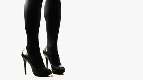 A woman dressed in black tights and high heels lift wallet Stock Footage