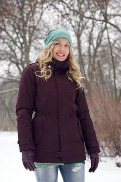 Woman dressed in winter clothing Stock Photos