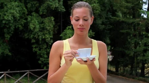 Woman drinking coffee Stock Footage 7754299