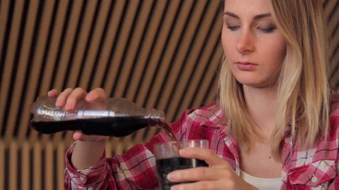 Woman drinking drinking cold drink beverage coke Stock Footage 72477159