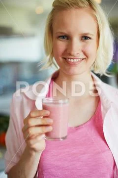 Woman Drinking Glass Of Juice