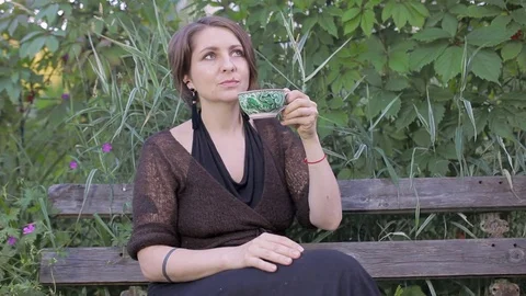 Woman is drinking tea Stock Footage 78643441