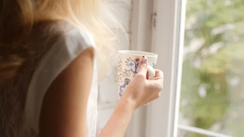 Woman Drinking Tea Stock Footage 97716512