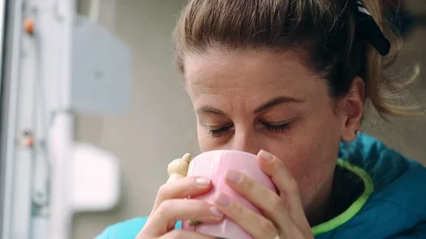 Woman drinking tea Stock Footage 98092678