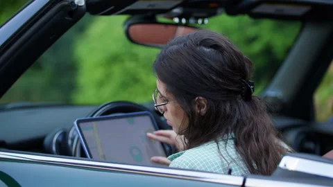 Woman Driver Using Tablet for Navigation Stock Footage 271497720