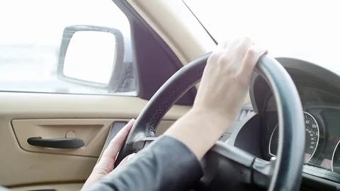 A woman driving a car Stock Footage