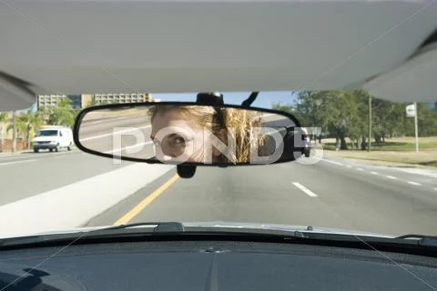 Woman Driving, Checking Rear View Mirror