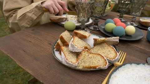 Woman eating during Easter dinner Stock Footage 122540782