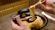 Woman Eating Famous Ichiran Ramen Noodle Stock Footage