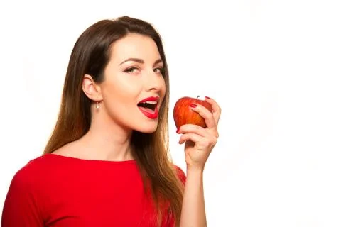 Woman Eating Red Apple Fruit Smiling Isolated on White Background Stock Photos