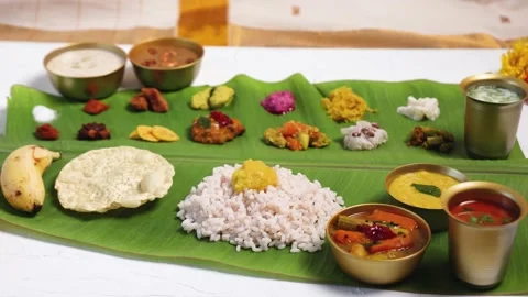 Woman eating traditional Onam sadhya wit... | Stock Video | Pond5