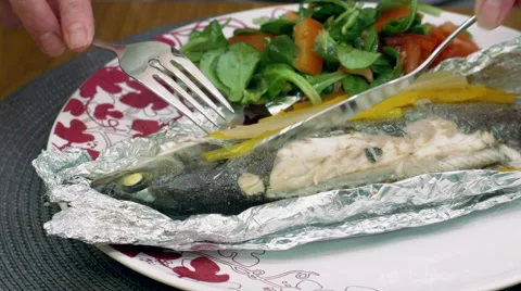Woman eats fish Video stock 68204419