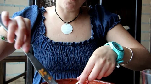 Woman eats with fork and knife Stock Footage 96371910