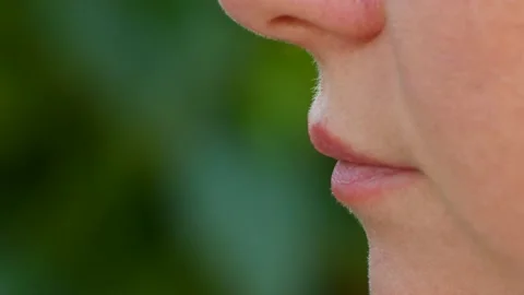 Woman eats nuts, almonds, closeup 스톡 동영상 99654808