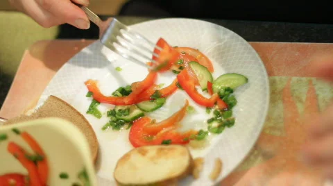 Woman eats salad. Stock Footage 657057