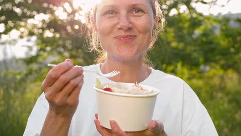 A woman eats  salad Video stock 274965645