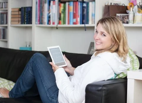 Woman with an ebook reader Stock Photos
