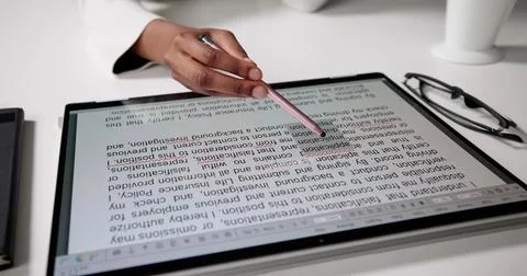 Woman Editing And Proofreading Script On Computer For Online Publication. Foto stock