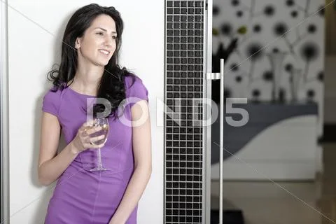 Woman in elegant kitchen Stock Photos