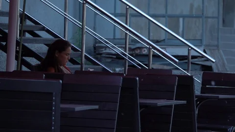 Woman in empty cafe Stock Footage 92060684