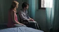 woman encourages disabled in a wheelchair to react and return to live HD Footage