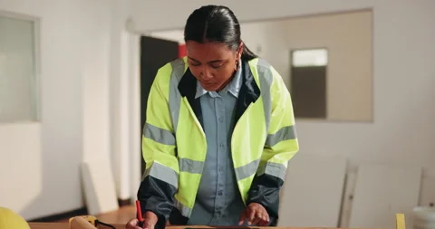 Woman, engineer and writing with tablet for construction, blueprint and research Stock Footage 341596063