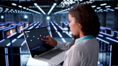 Woman Engineer Checks Data Servers Stock Footage 336377018