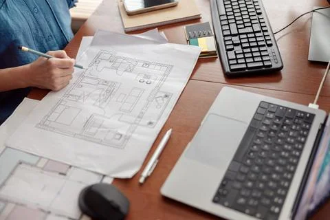 Woman engineer construction is developing construction project documentation Stock Photos