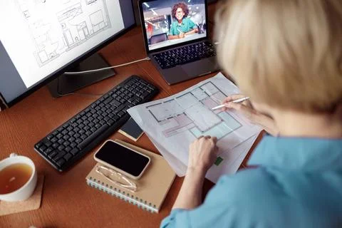 Woman engineer construction is developing construction project documentation Stock Photos