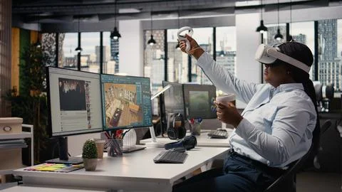 Woman engineer developing architectural layout with VR glasses Stock Photos