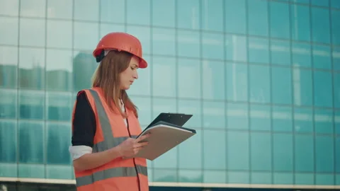 Woman Engineer or Architect Reading the Clipboard. Stock Footage 236263448