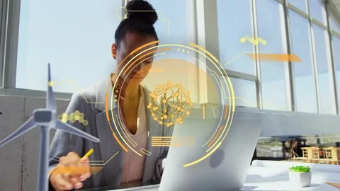 Woman engineer pausing, marking plans, tapping laptop while AR HUD brightening, Stock Footage 334373341