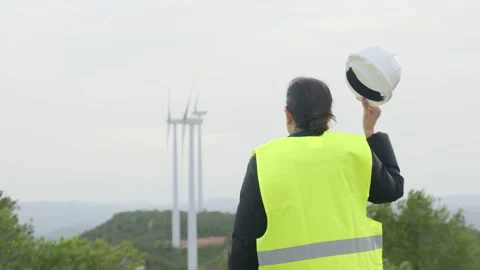 Woman engineer with tablet computer working with wind turbines Vídeos de archivo 270454775