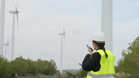 Woman engineer with tablet computer working with wind turbines Vídeos de archivo 270454952