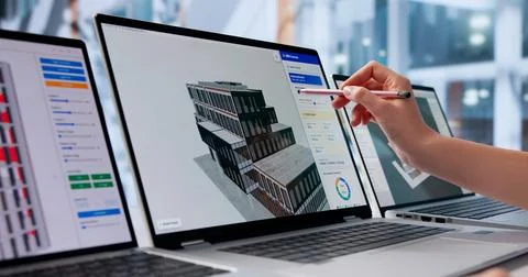 Woman Engineer Uses 3D Software On Laptop Designing Sustainable HVAC Systems. 写真素材