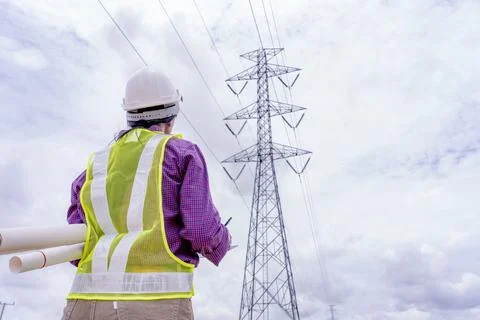 Woman engineers construction worker checking layout on digital ipad or comput Stock Photos