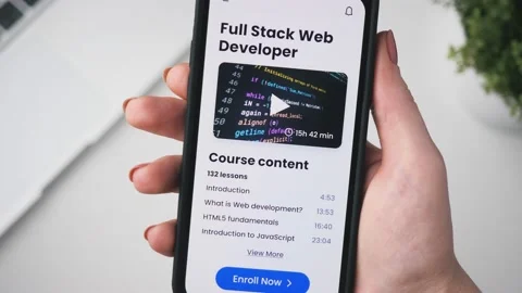 Woman enrolling into an coding online course. Checking full stack web Stock Footage 234056581