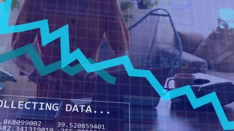 Woman entering frame sitting at table writing sparking line chart scrolling data Stock Footage 335761561
