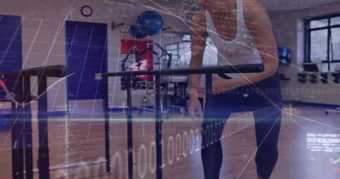 Woman entering gym, testing parallel bars for balance, holding smartphone, Stock-Footage 313493706