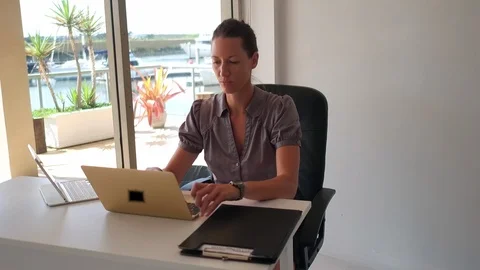 Woman entries data into computer Stock Footage 88143067