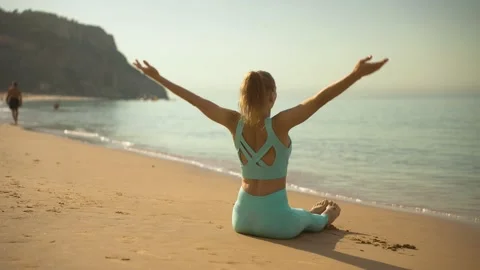 Woman exercising on the beach Stock Footage 201168549